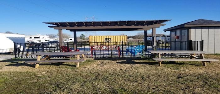 Kids playground and covered pavilion at Texas 6 RV Park
