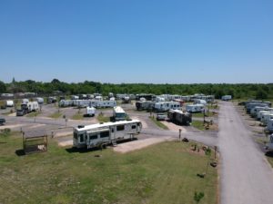 Private decks at back-in RV sites at Texas 6 RV Park